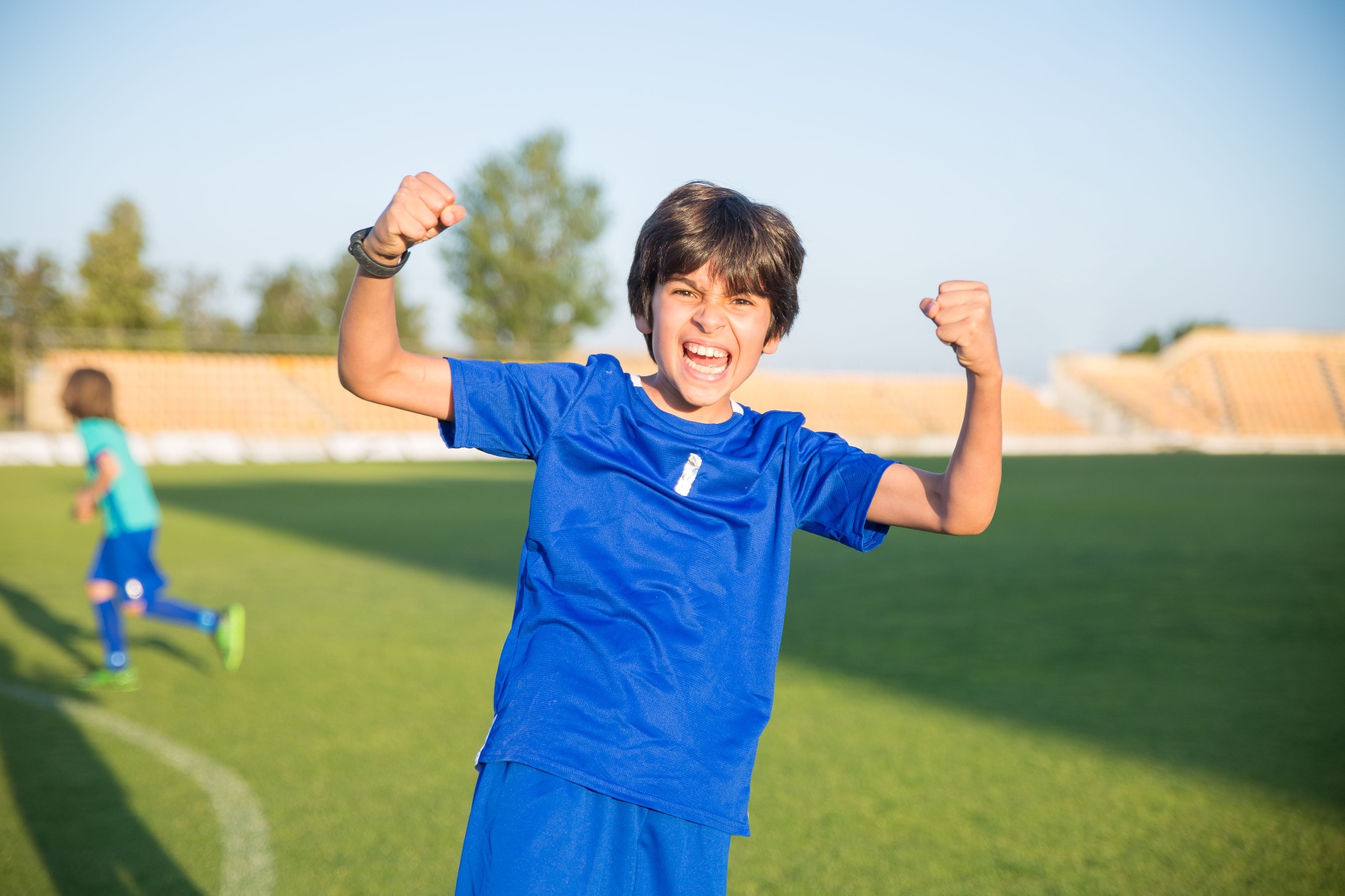 Michael cheering on the soccer field